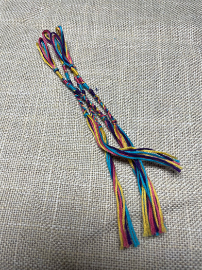 Set of four multi-color tzit-zit tassels with blue cord – yellow pink blue purple by the Family of Yah