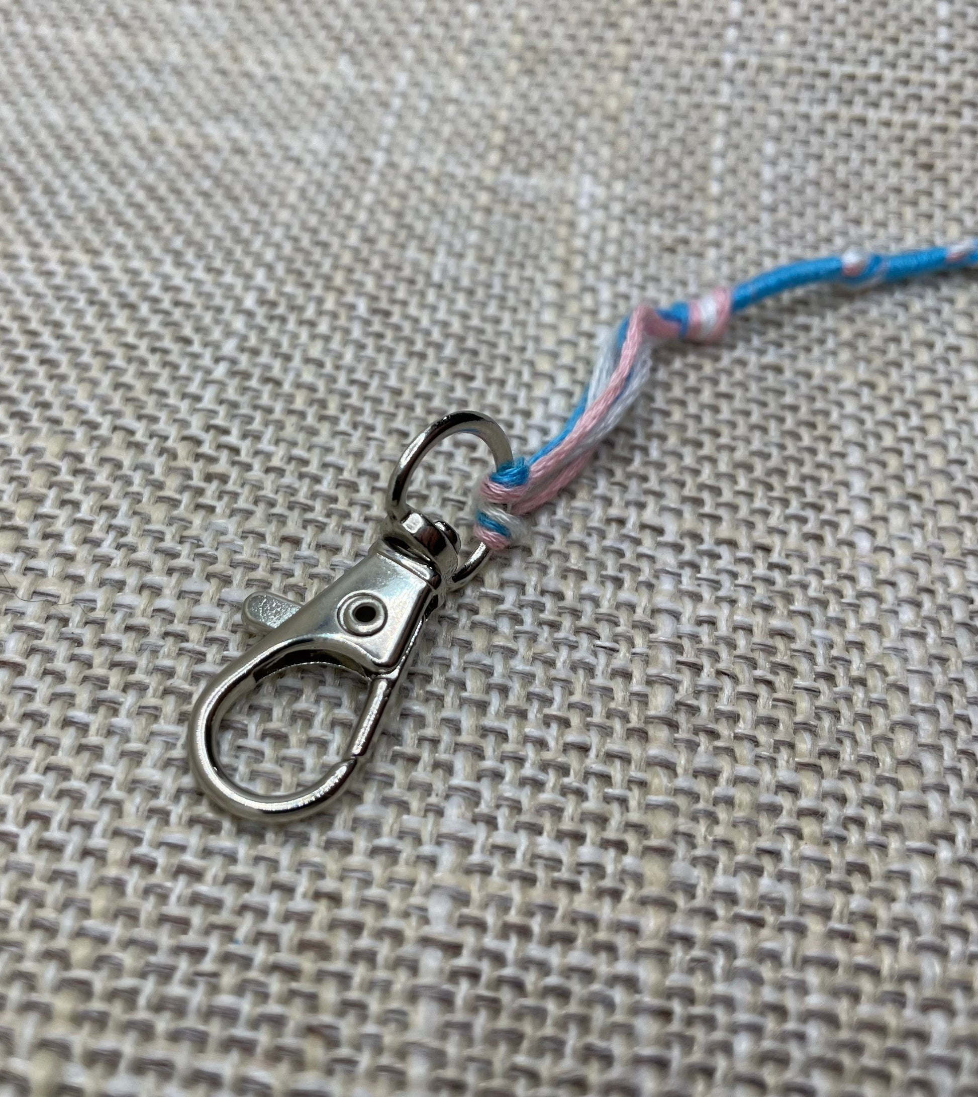 Swivel loop Clip, View of Clip attached to Tassel or Fringe, Tassel Clips, Tzit Tzit Clip Metallic Silver painted